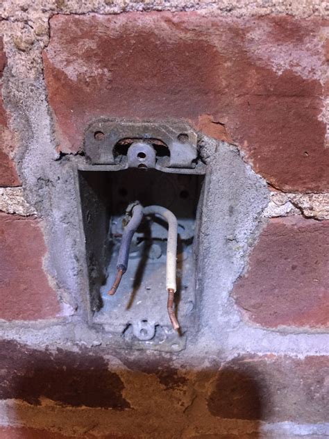 brick electrical junction box|exposed electrical outlet box.